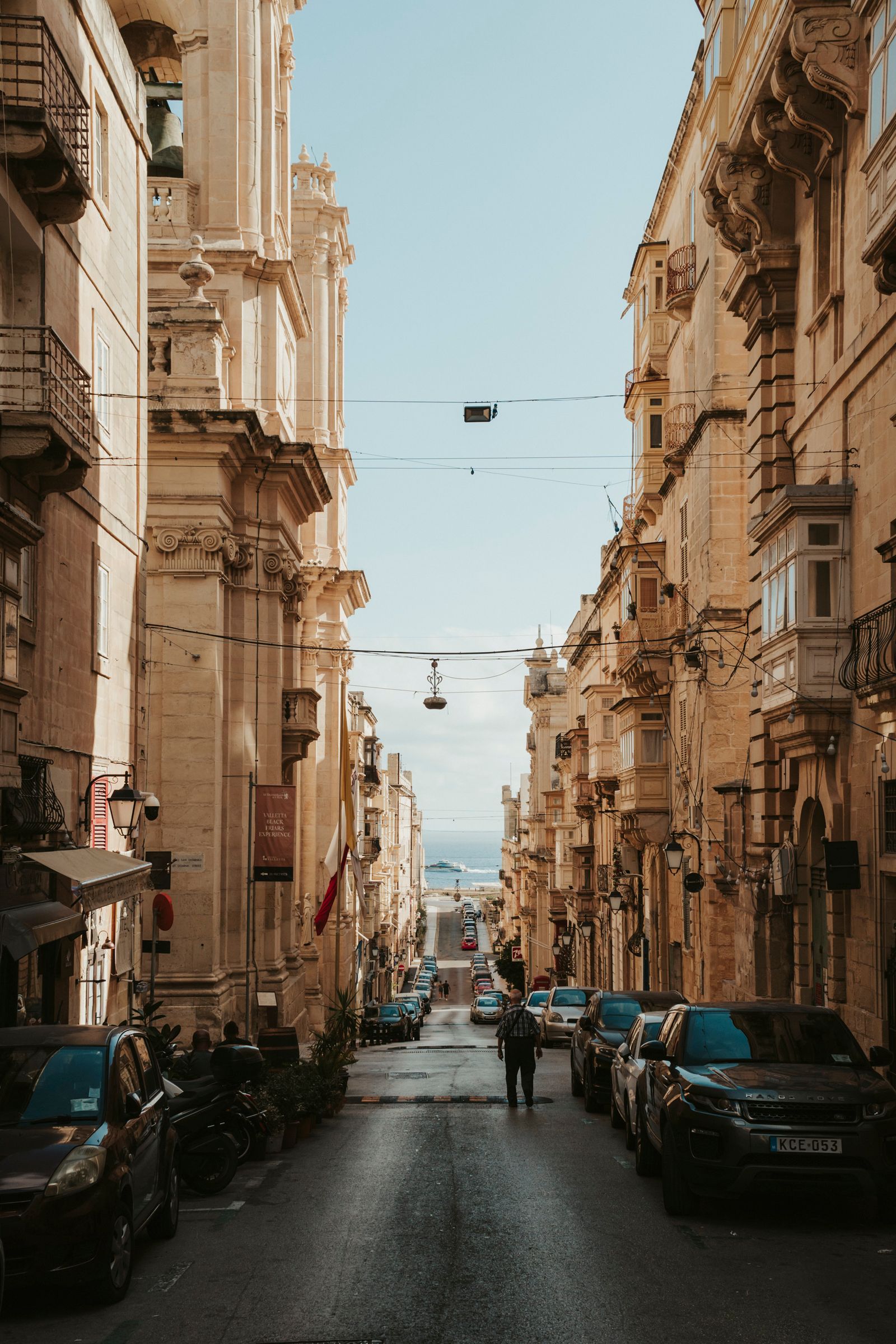 Small rental car on a narrow road in Malta